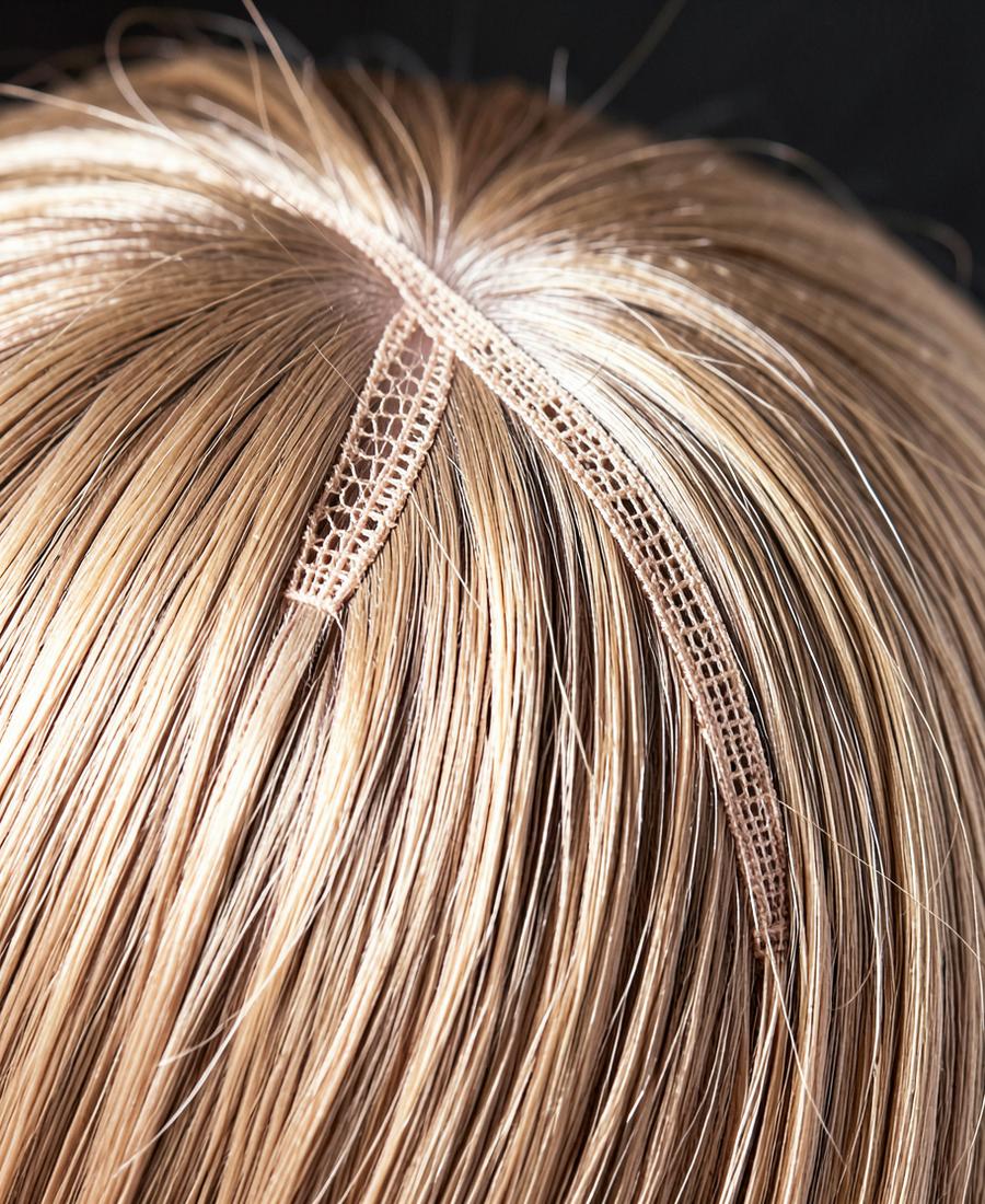 Close-up of a lace closure parting on a wig